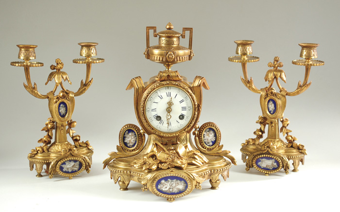 THREE-PIECE GILT BRONZE CLOCK SET