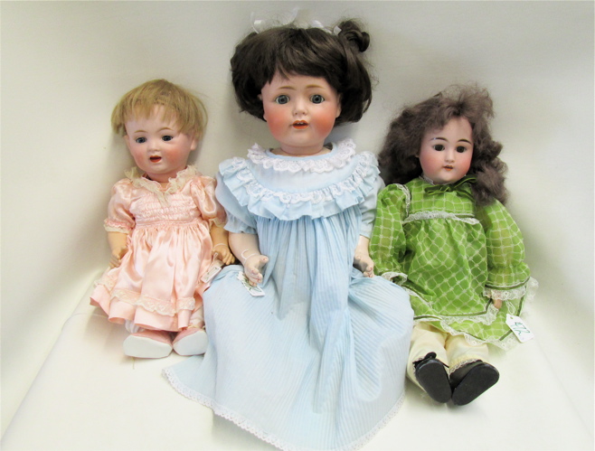 THREE BISQUE SOCKET HEAD DOLLS  16fc78