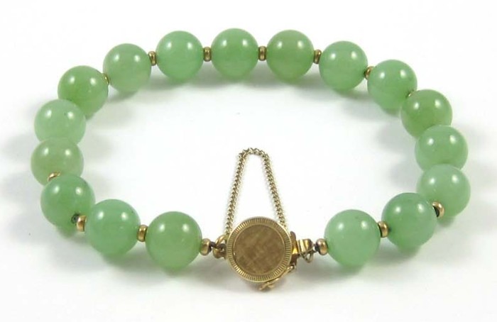 JADE AND FOURTEEN KARAT GOLD BRACELET