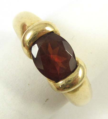 GARNET AND FOURTEEN KARAT GOLD 16fcce