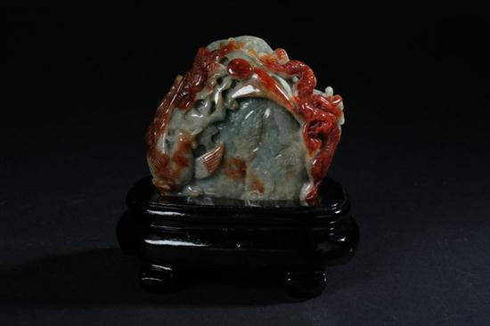 CHINESE CELADON AND RUSSET JADEITE FIGURAL