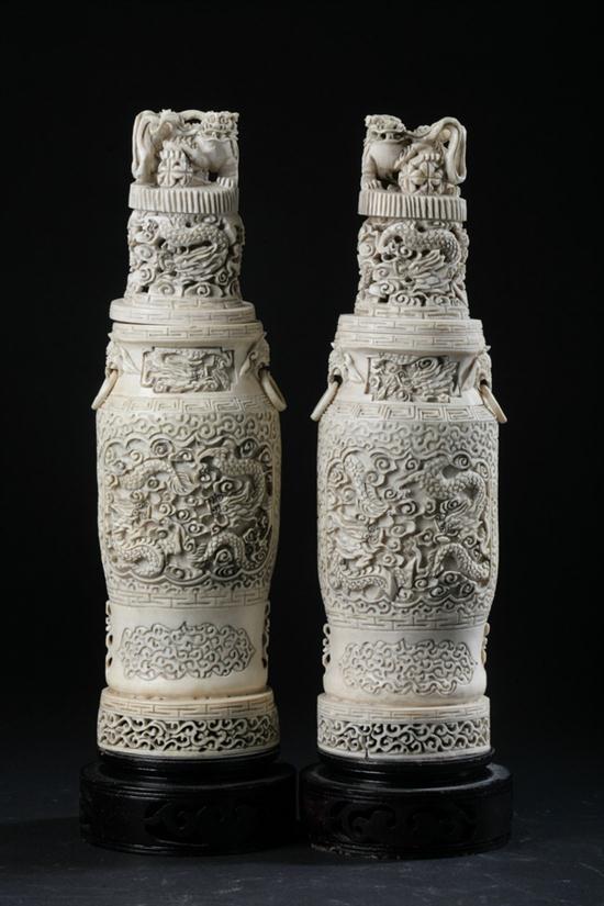 PAIR CHINESE IVORY VASES AND COVERS.