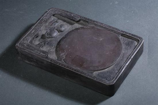 CHINESE INKSTONE. Carved to depict two