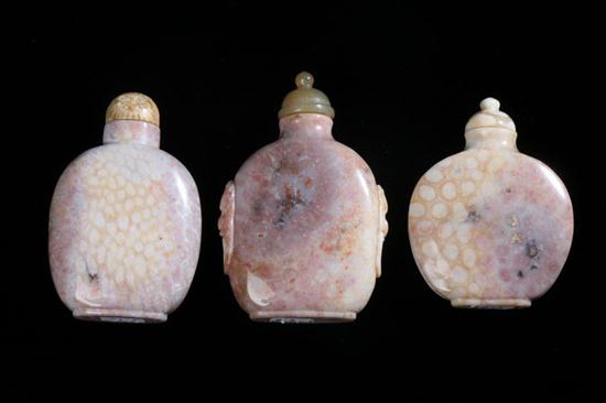 THREE CHINESE CORAL SNUFF BOTTLES.