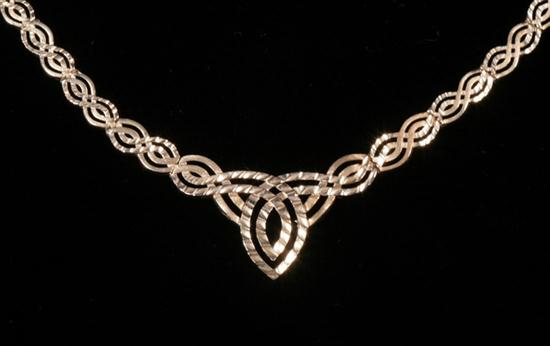 10K YELLOW GOLD OPENWORK FLEXIBLE CHOKER.