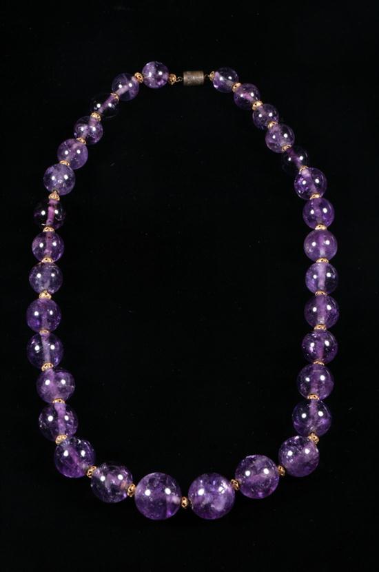 GRADUATED AMETHYST BEAD NECKLACE. 32