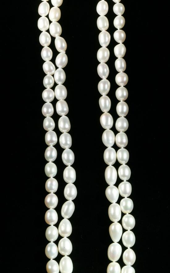 ENDLESS STRAND BAROQUE PEARL NECKLACE.