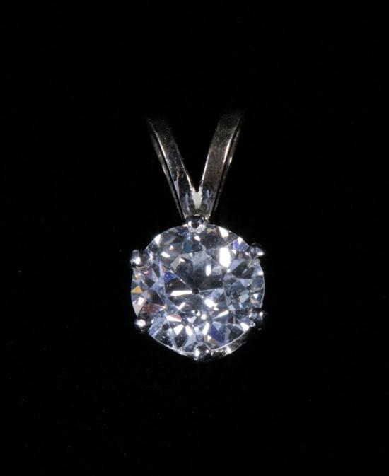 14K WHITE GOLD AND DIAMOND PENDANT.