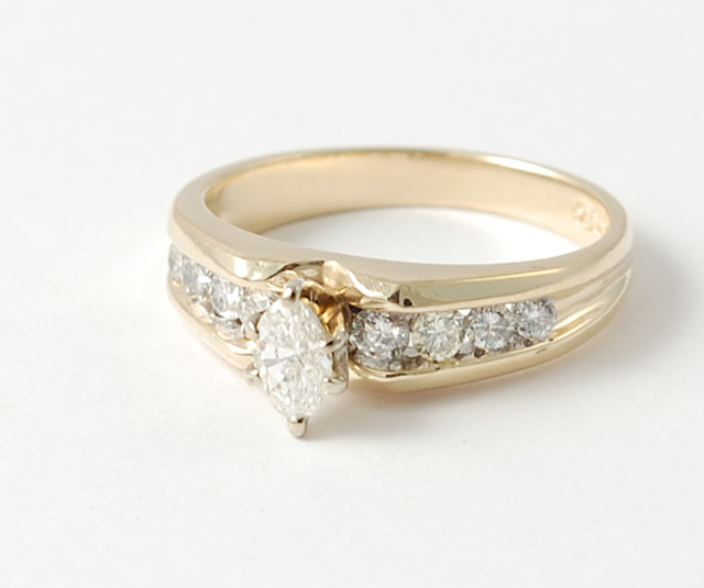 DIAMOND AND FOURTEEN KARAT GOLD 1704fe