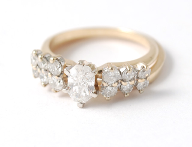 DIAMOND AND FOURTEEN KARAT GOLD WEDDING