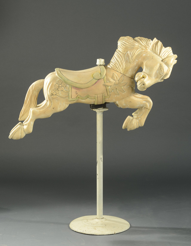 CARVED PINE CAROUSEL HORSE ON STAND.