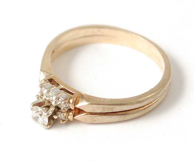 DIAMOND AND FOURTEEN KARAT GOLD WEDDING