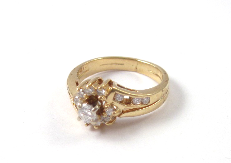 DIAMOND AND FOURTEEN KARAT GOLD WEDDING