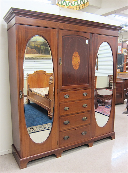 AN EDWARDIAN INLAID MAHOGANY WARDROBE