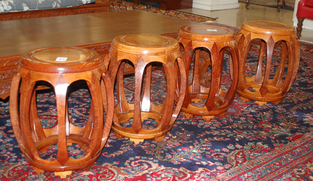 A SET OF FOUR ROSEWOOD DRUM STOOLS 1707cf