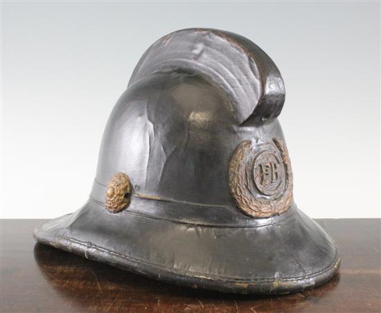 A Victorian leather fireman's helmet