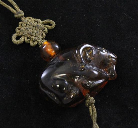 A Chinese amber ram pendant late 170930