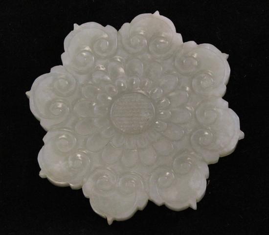 A Chinese celadon jade disc 19th 17094a