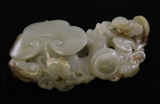 A Chinese Celadon and russet jade 170957