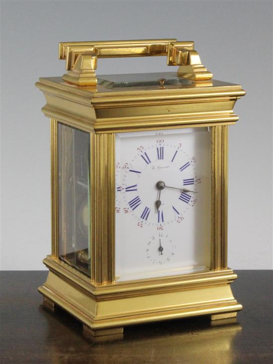 An Edwardian gilt brass hour repeating