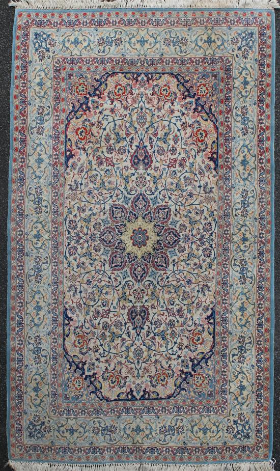 An Isphahan rug with field of scrolling