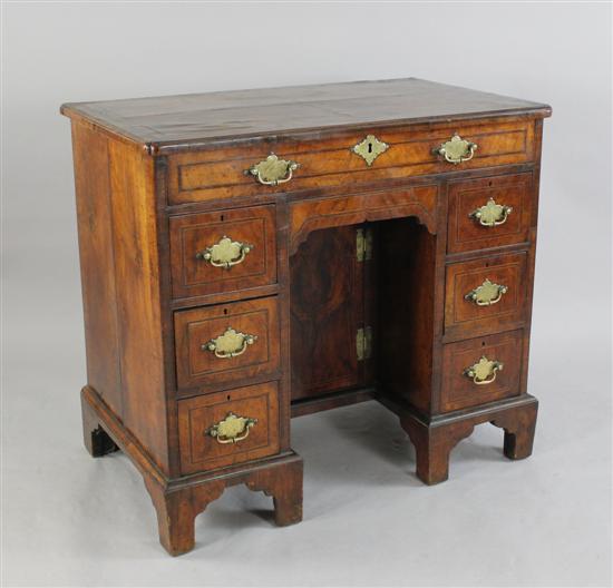 A George II banded walnut and parquetry 1709a4