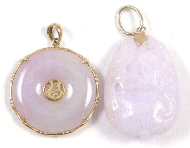 TWO CHINESE JADE PENDANTS one a