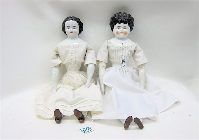 TWO 20TH CENTURY CHINA HEAD DOLLS with