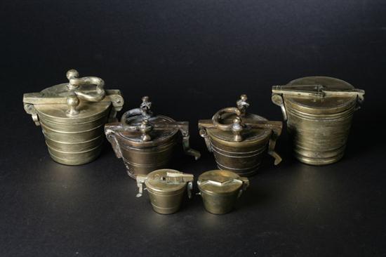 SIX BRASS NESTING WEIGHTS. 18th-19th