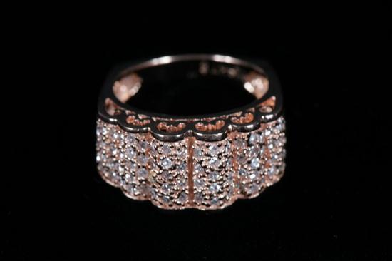14K ROSE GOLD AND DIAMOND RING. Scalloped