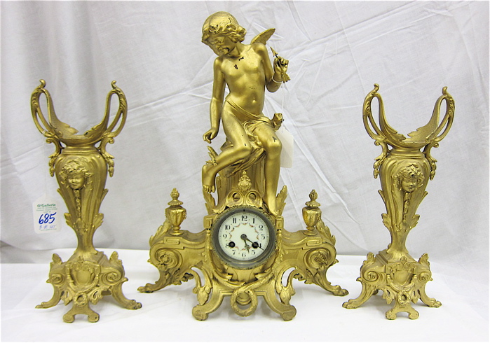 THREE PIECE GILDED METAL CLOCK 16eb6c