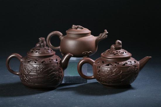 THREE CHINESE YIXING TEA POTS.