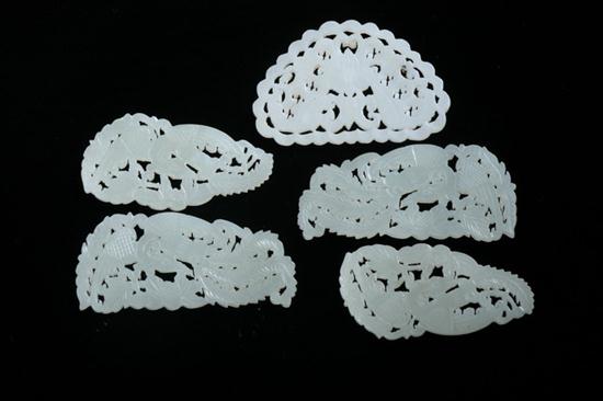FIVE CHINESE RETICULATED JADE PLAQUES.