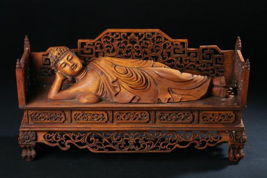 CHINESE BOXWOOD FIGURE OF RECLINING