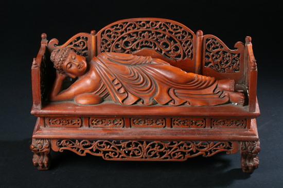 CHINESE WOOD FIGURE OF RECLINING