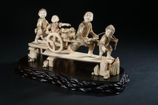 JAPANESE IVORY OKIMONO OF FOUR