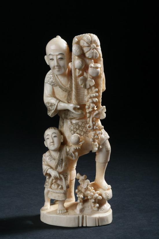 JAPANESE OKIMONO OF A MAN AND A CHILD