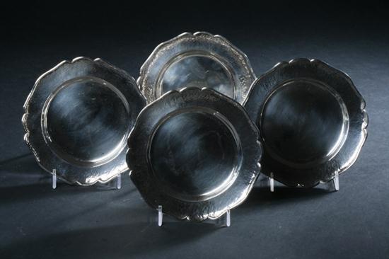 EIGHT SILVER BREAD AND BUTTER PLATES