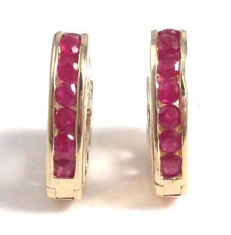 PAIR OF RUBY AND YELLOW GOLD 'LOVE'