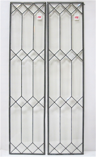 A PAIR OF BEVELED AND LEADED GLASS 16f096