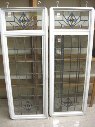A PAIR OF LEADED GLASS WINDOWS