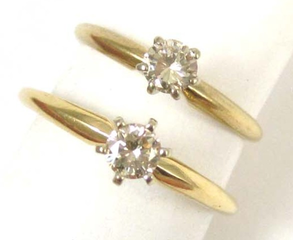 TWO DIAMOND SOLITAIRE RINGS each