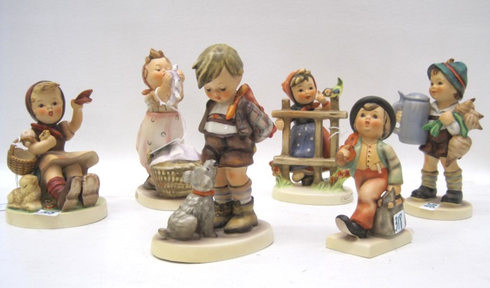 SIX GERMAN HUMMEL PORCELAIN FIGURINES;