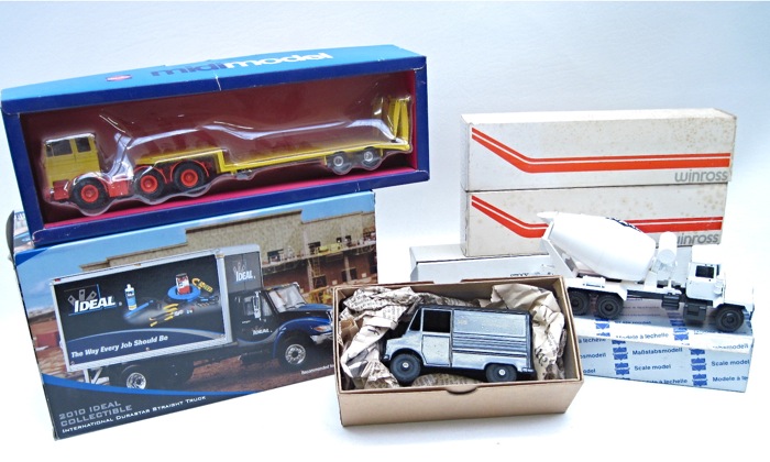 SEVEN DIECAST METAL SCALE TRUCKS;