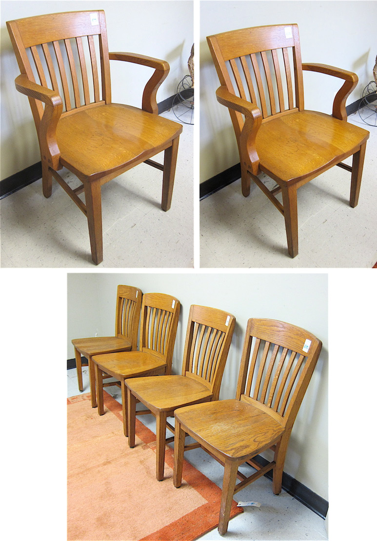 A GROUP OF SIX OAK OFFICE CHAIRS