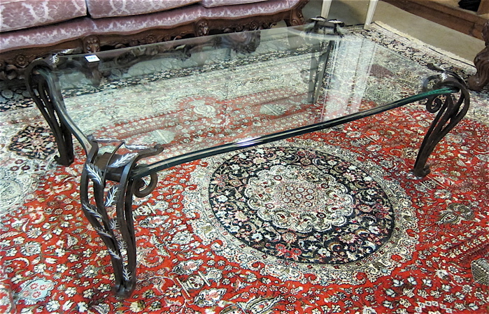 GLASS AND WROUGHT IRON COFFEE TABLE