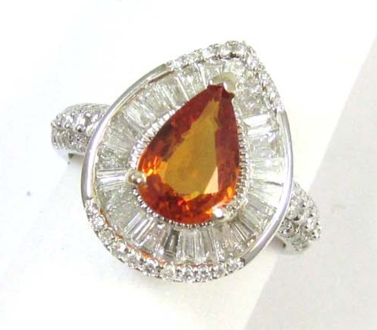 ORANGE SAPPHIRE AND DIAMOND RING