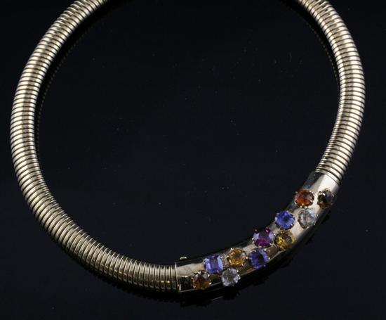 A gold and gem set torque necklace 171a6e