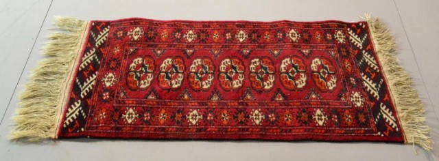 A SMALL RED BUKHARA RUGWith black 171c68