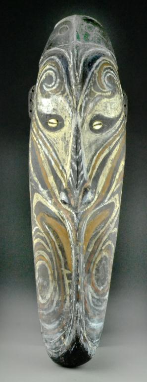 A Carved And Painted Oceanic Wood